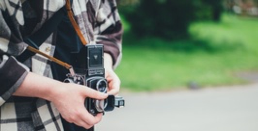 person holding a camera