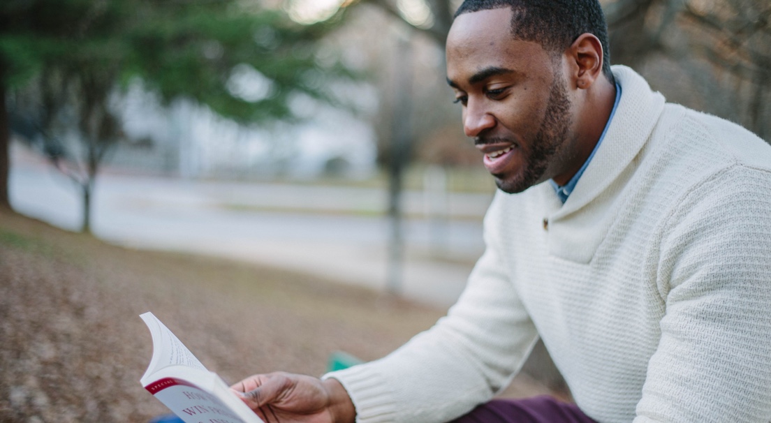 man reading a book